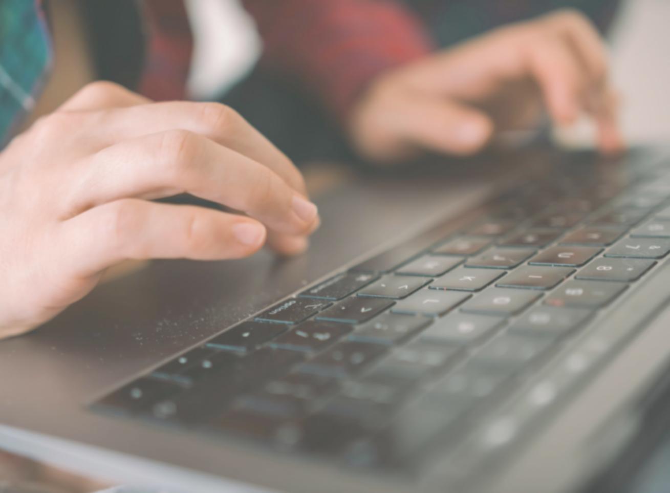 Person analyzing financial documents and expense reports
